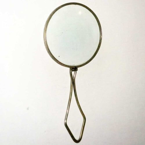 Vintage folding magnifying glass