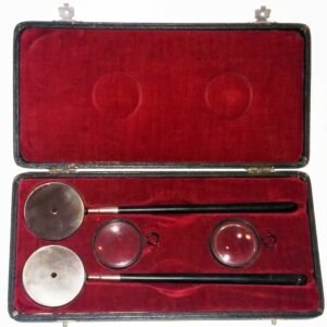 Antique 1910 Liebreich Military Ophthalmoscope set with two mirrors and two condensing lenses in original red velvet fitted case, designed by Dr. Richard Liebreich for military medical services