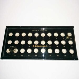 Antique 1960 Danker and Wolek hard contact lens fitting set with 29 PMMA trial lenses in original fitted case, inscribed R.G. Small M.D., mid-century contact lens fitting equipment