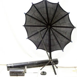 Antique foldable black cloth perimeter with ribbed wire frame and test marks on cylindrical storage container, used for visual field testing in ophthalmic examinations
