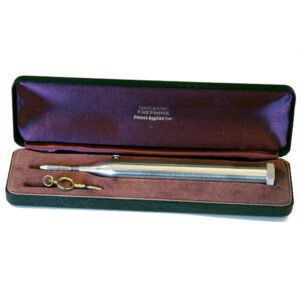 Antique 1931 Green's Trephine for Glaucoma with brass and steel construction, presented in original fitted case with purple velvet lining, early 20th century ophthalmic glaucoma surgery instrument