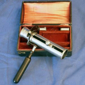 Mergier's optometer 1892 in original fitted wooden case with orange lining, cylindrical optical tube and dark handle, French ophthalmology instrument
