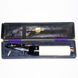 Antique 1946 Keeler Senior Wide Angle Morton Ophthalmoscope with battery handle, five-opening lens ring, pupil size dial, and red-free filter, in original black leatherette case