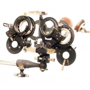 DeZeng phoropter 1922 early combined refraction instrument with multiple lens wheels and prism compensators, antique ophthalmic examination equipment