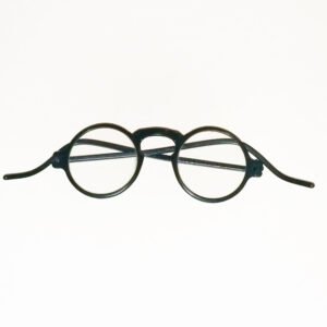 1927 round lens black xylonite spectacles with skull-shaped temples