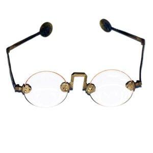Antique Chinese eyewear with brass frames, ornate bridge, weighted ear loops, and clear non-prescription round lenses
