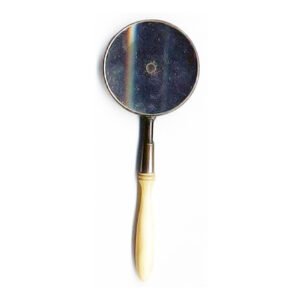 Antique Folin ophthalmoscope circa 1865 by Nachet Paris, brass frame with concave mirror, ivory handle, and rotating correcting lens disc